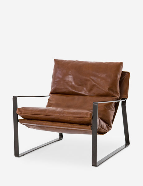 | Angled right side view of brown leather Marlyne sling-back accent chair with black metal frame