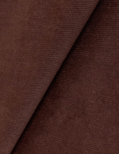 #color::wine-mini-corduroy #size::full #size::queen #size::king #size::cal-king | Close up view of the Gladys extended headboard upholstered platform bed in wine corduroy