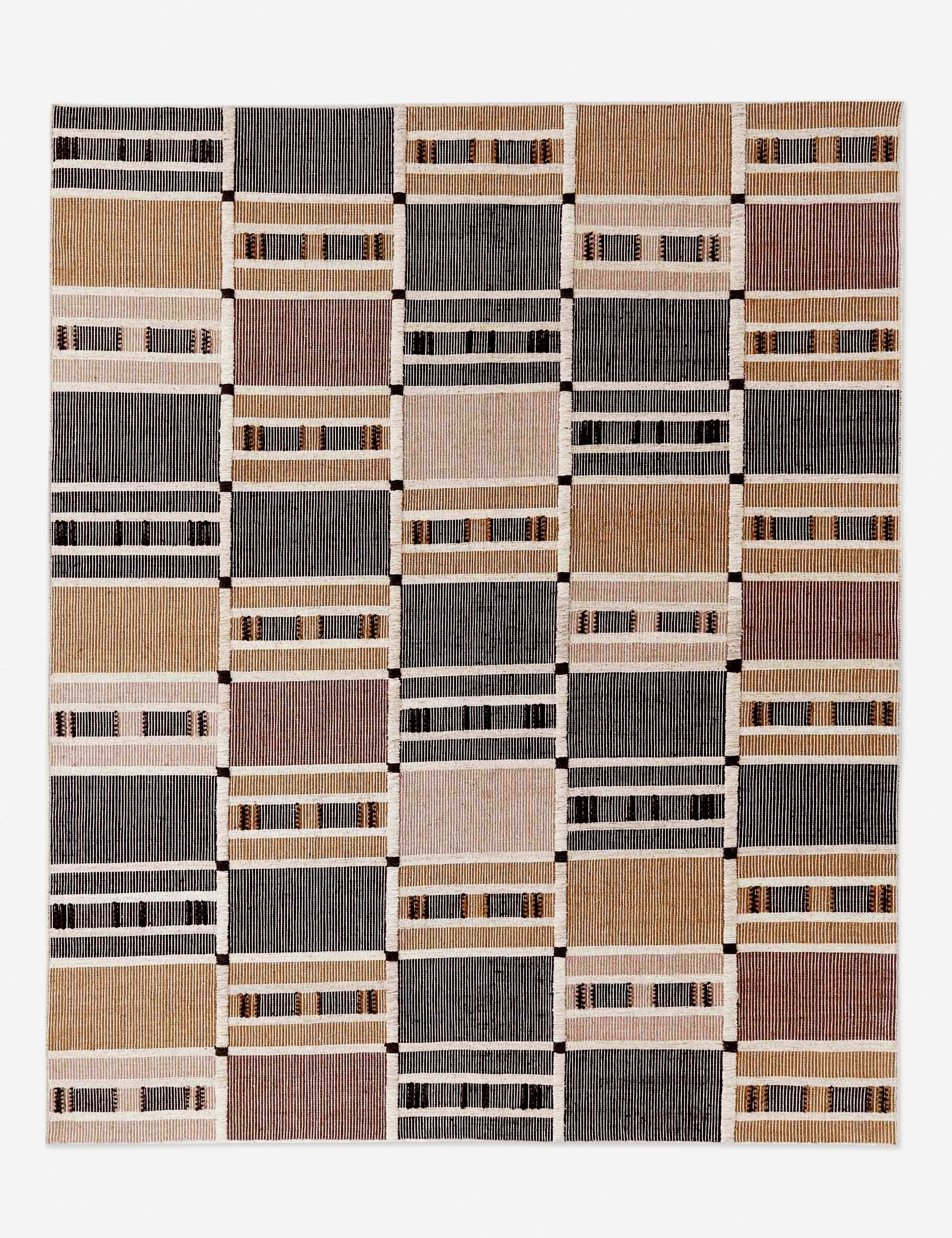Anni wool-cotton blended rug with warm-toned offsetting stripes by Nina Freudenberger