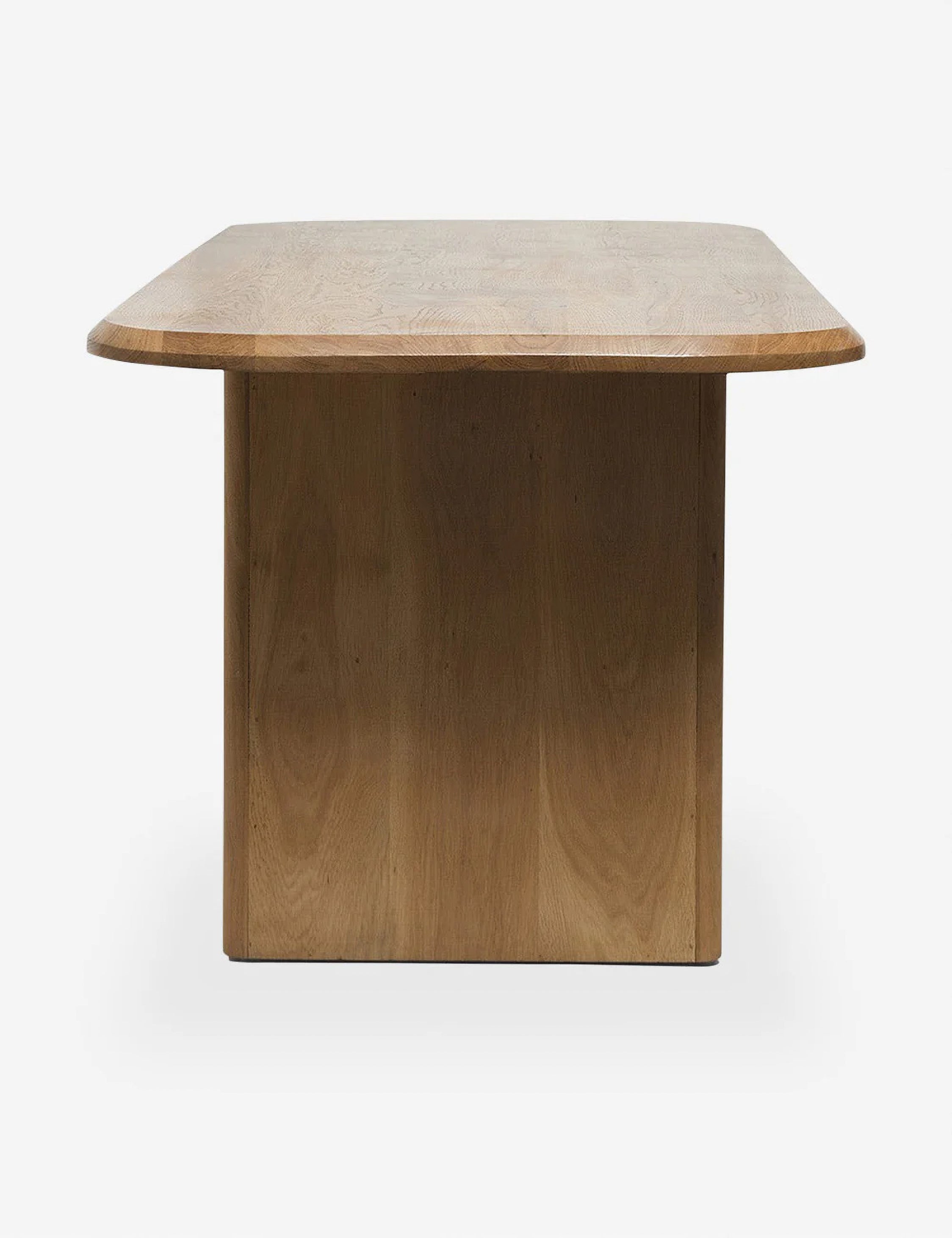 Angled view of the Archer Natural Rectangular Dining Table