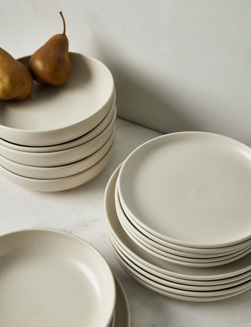 #color::vanilla #style::18-piece-set-with-pasta-bowl | Angled view of the Vanilla-toned Pacifica Dinnerware (18-Piece Set) by Casafina
