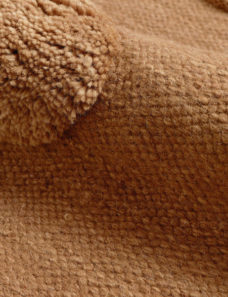 #color::camel #size::2--x-3- #size::2-6--x-8- #size::3--x-5- #size::6--x-9- #size::8--x-10- #size::9--x-12- #size::10--x-14- #size::12--x-15- | Close up of the Kohta high-low pile dot design wool area rug in camel