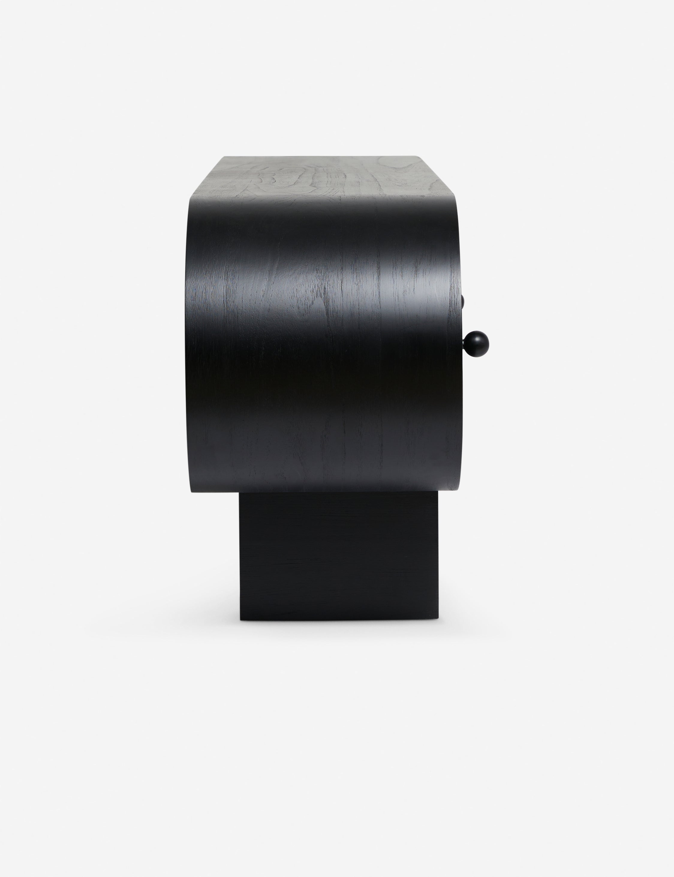 Side view of the Laughlin retro pill shaped sideboard cabinet in black