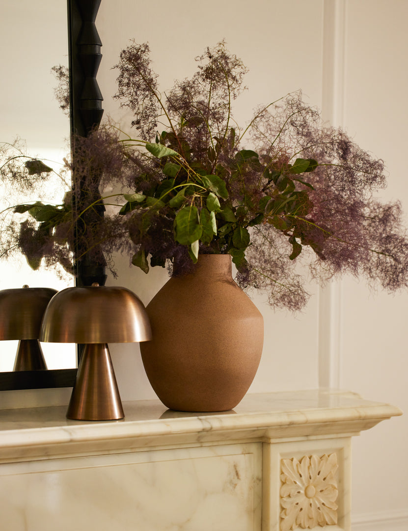 #showall::42008022253667 | Monochromatic Wembley Cordless Mini Table Lamp styled on a mantel next to a vase