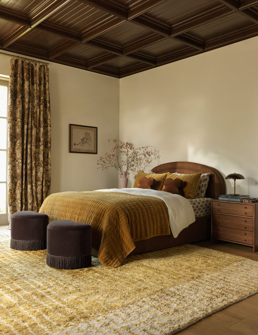 #color::orche #size::6--x-9- #size::8--x-10- #size::9--x-12- #size::10--x-14- #size::12--x-15- | A bedroom featuring the Bhari thick organic design hand-knotted wool rug.