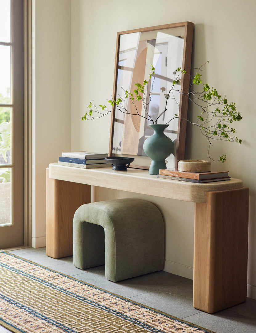 #color::orche #size::2-6--x-8--runner | The Manca traditional geometric motif hand-knotted wool runner rug styled in front of a console table.