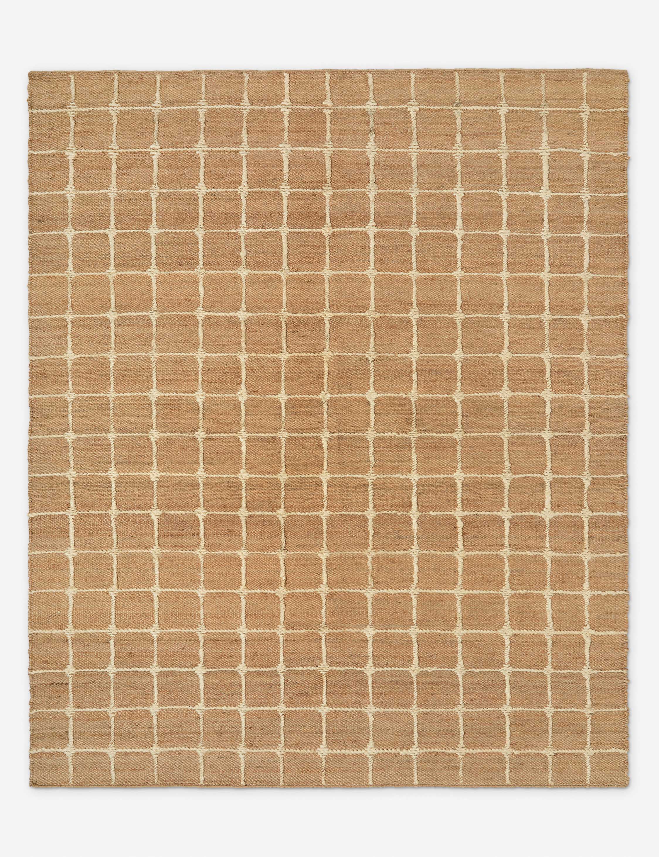 The Beddow Flatweave Jute Grid Rug by Jake Arnold.