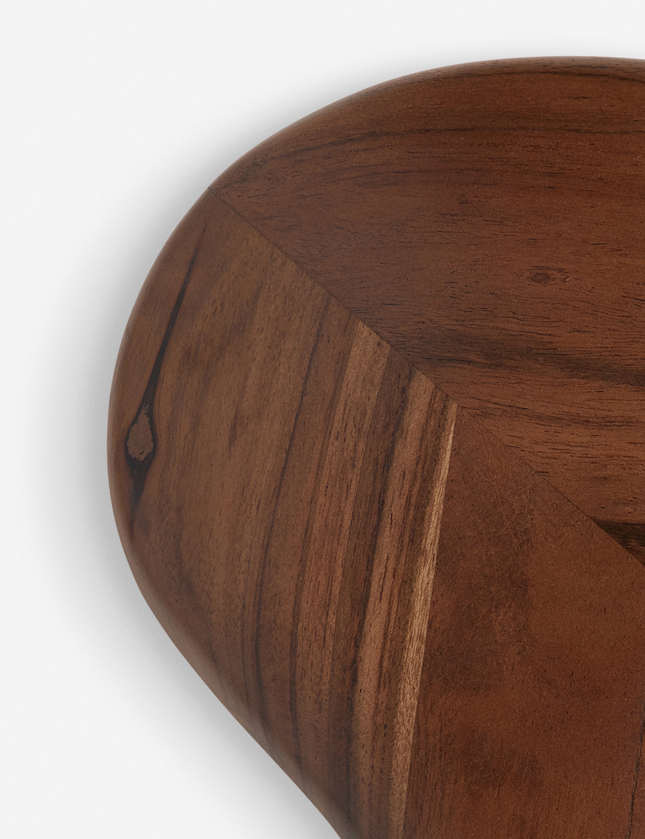 Close up of the frame of the Cambria chunky wood frame wavy silhouette mirror by Aimee Song