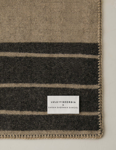 #color::black-and-beige | Corner of the Checkered wool throw blanket in black and beige