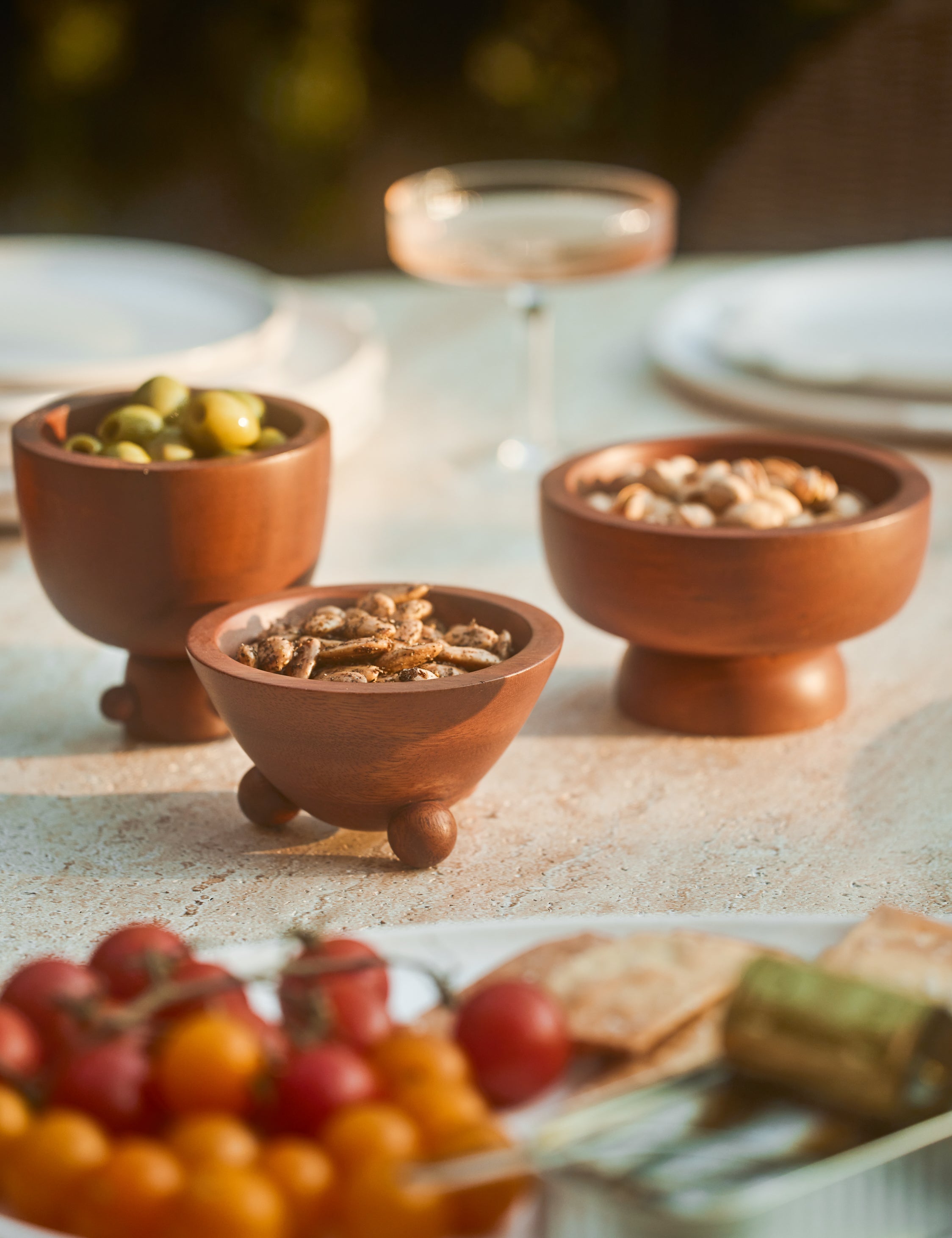 Set of three mini footed walnut bowls by Sarah Sherman Samuel