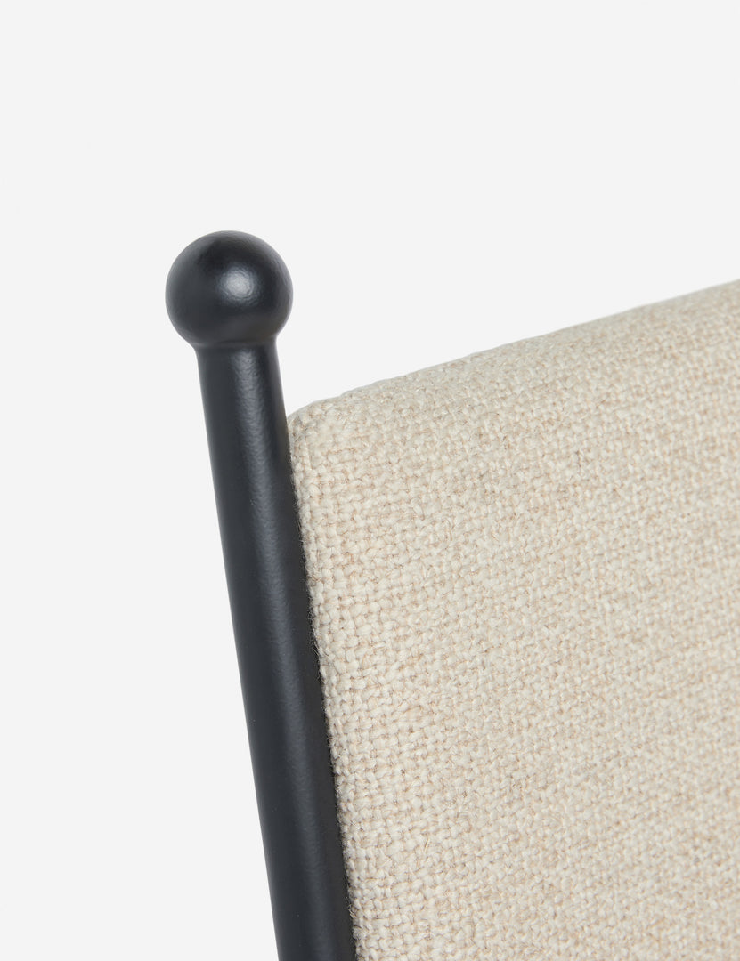#color::taupe-basketweave | Close up of the Fidia curved metal silhouette dining chair by Aimee Song