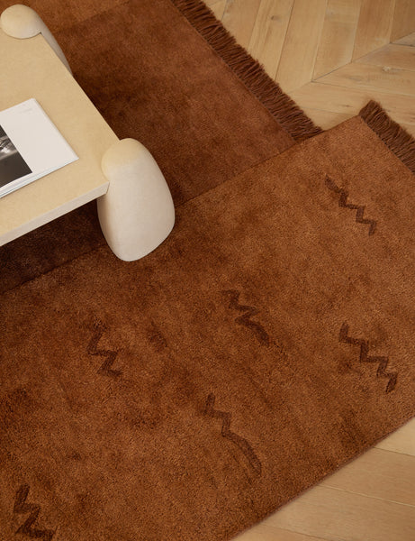 #size::6--x-9- #size::8--x-10- #size::9--x-12- #size::10--x-14- #size::12--x-15- | Koukero irregular shaped fringe wool area rug styled under a coffee table
