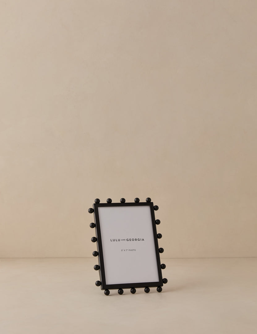 #color::black #size::5--x-7-