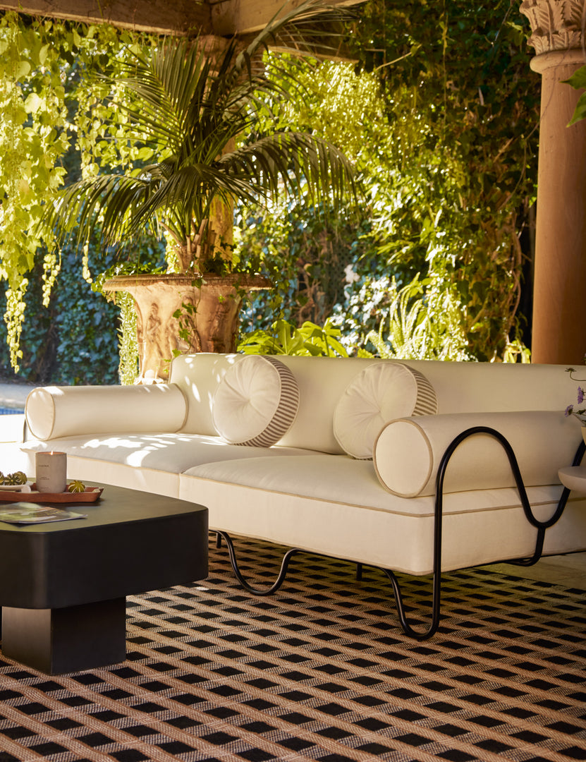 #color::brown | Littu Indoor / Outdoor Striped Disc Pillow by Sarah Sherman Samuel in Brown styled on an outdoor sofa.