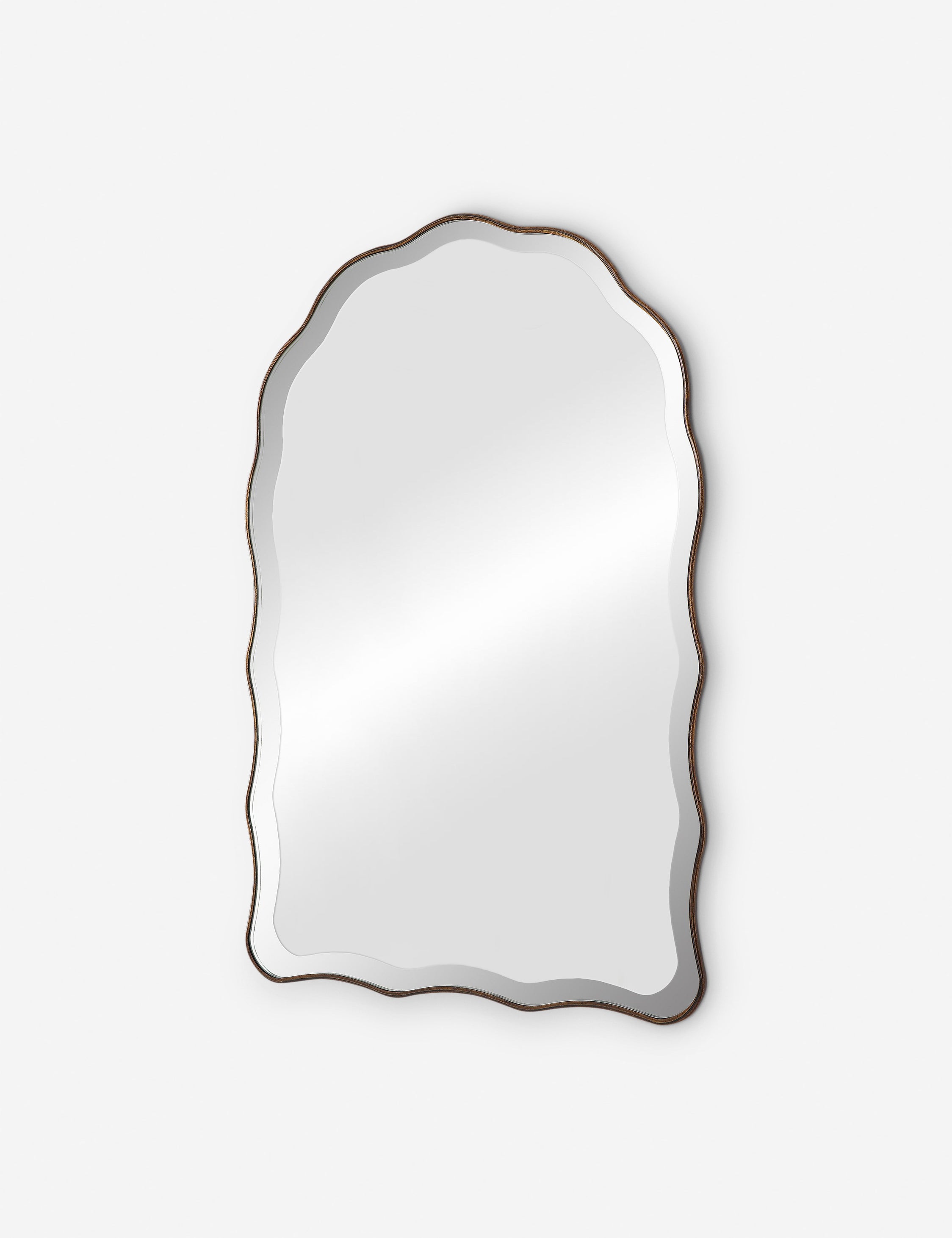 Angled view of the Gannet scalloped frame wall mirror
