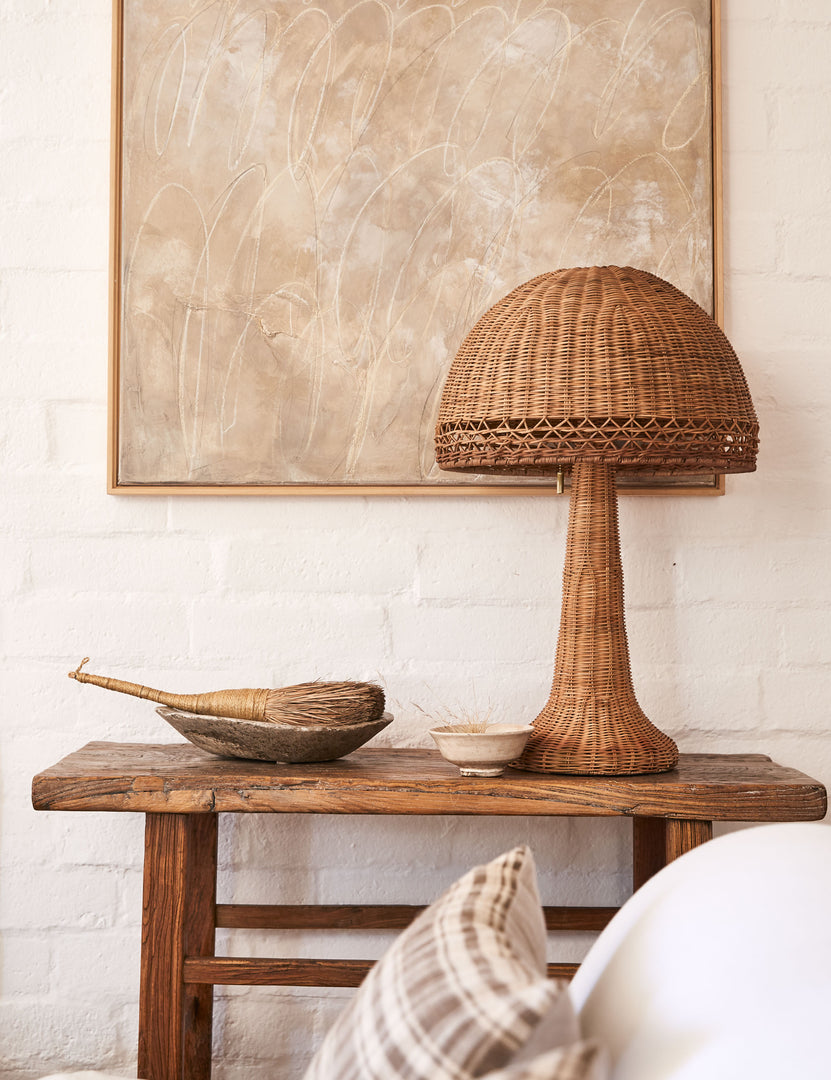 #color::natural #size::large | Quinley dome rattan coast table lamp styled on a rustic accent table.