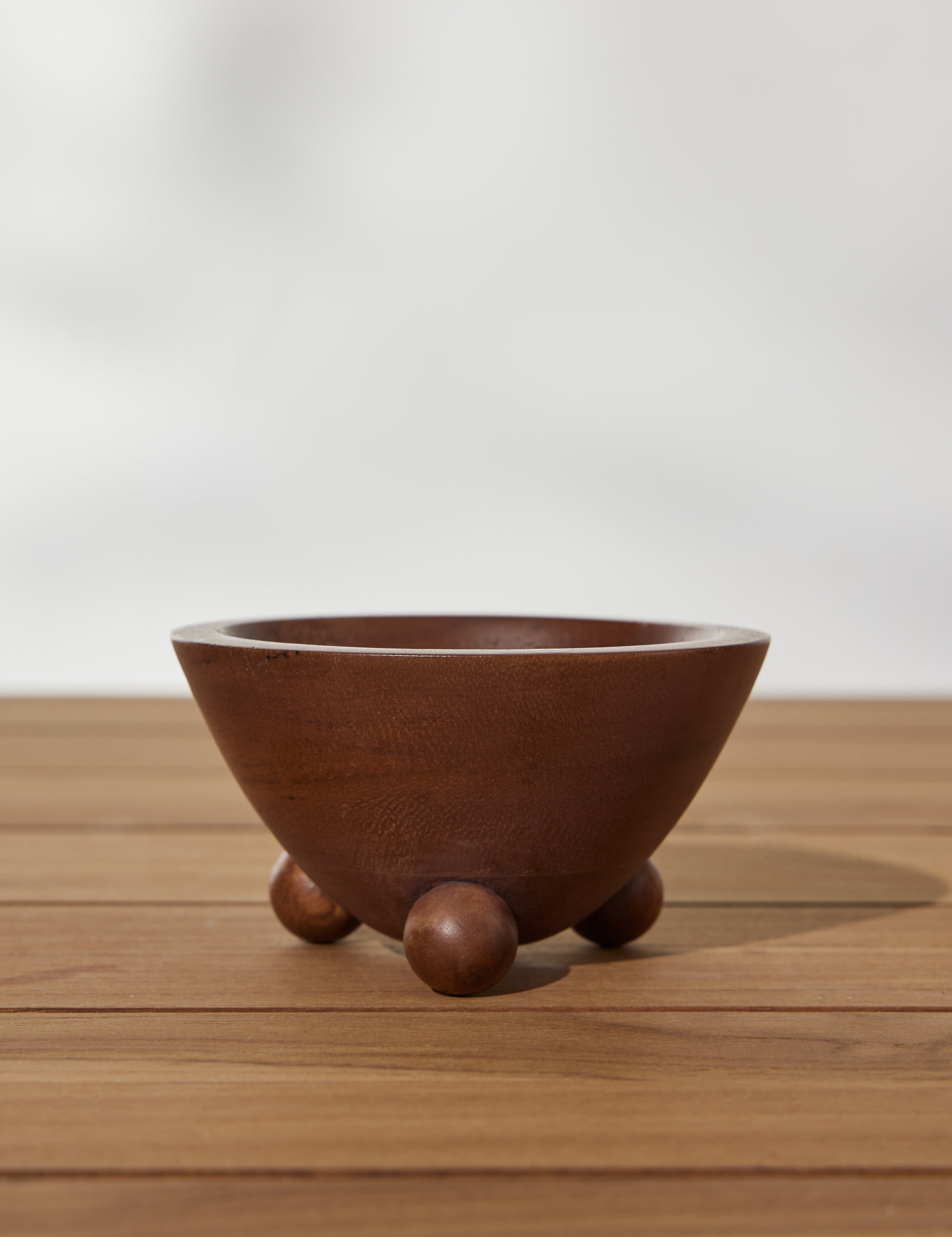 Singular bowl of the Set of three mini footed walnut bowls by Sarah Sherman Samuel
