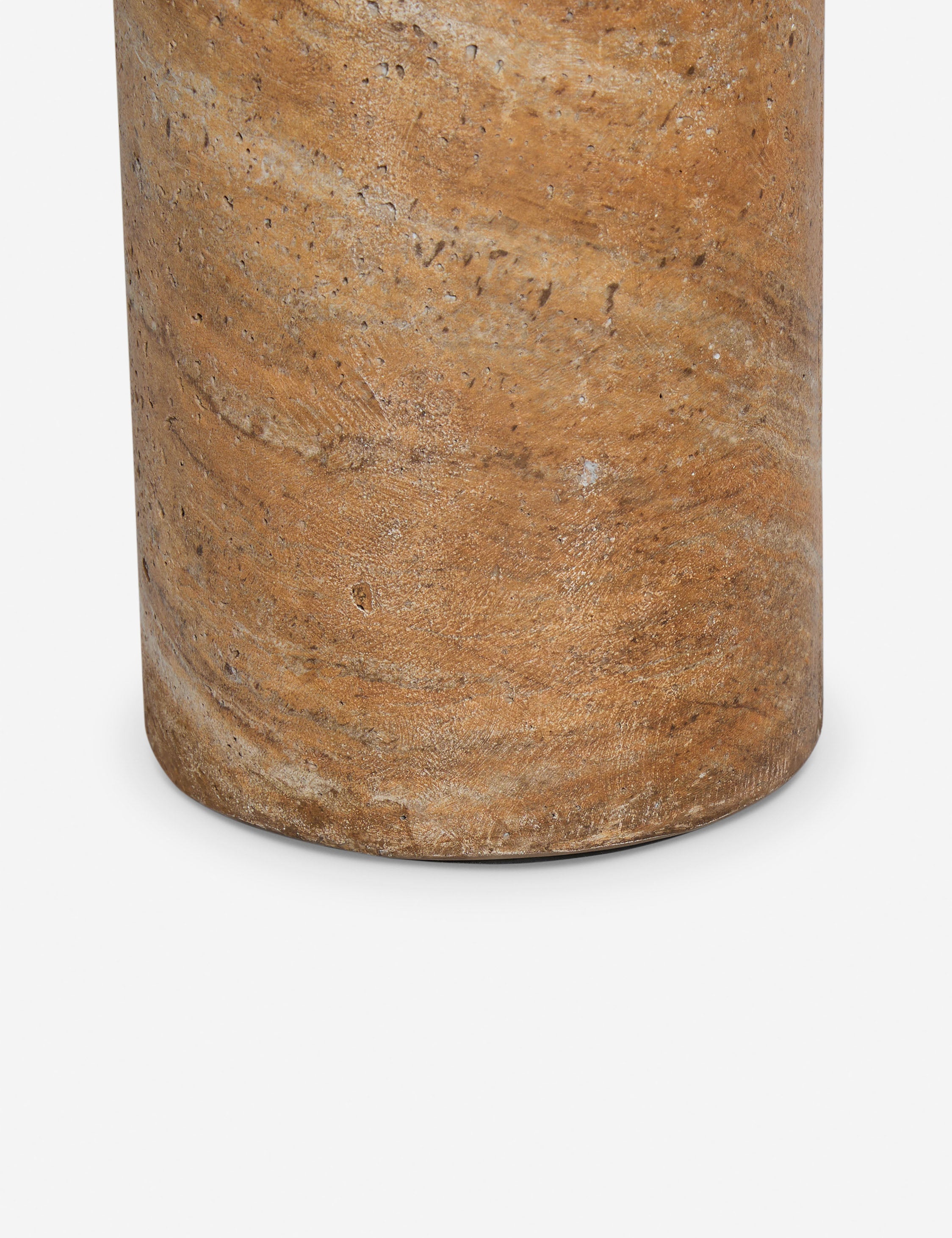 Close up of the Mona round stone drink table.
