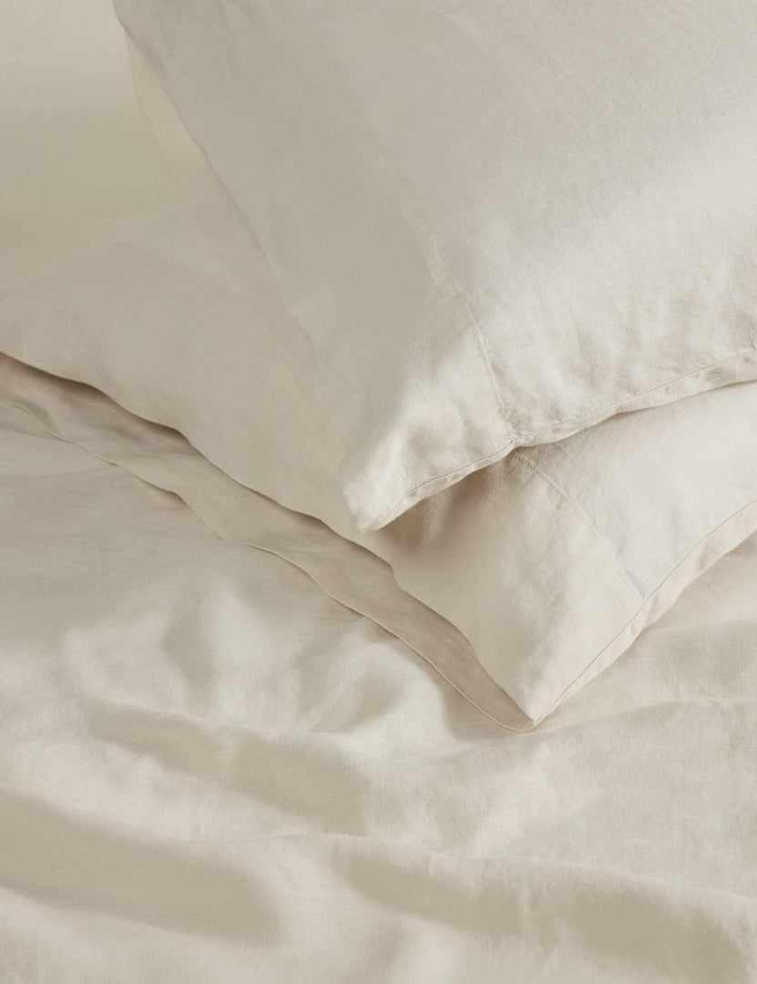 #color::cream #size::standard #size::king | Close up view of the Essie soft, breathable hemp pillowcase