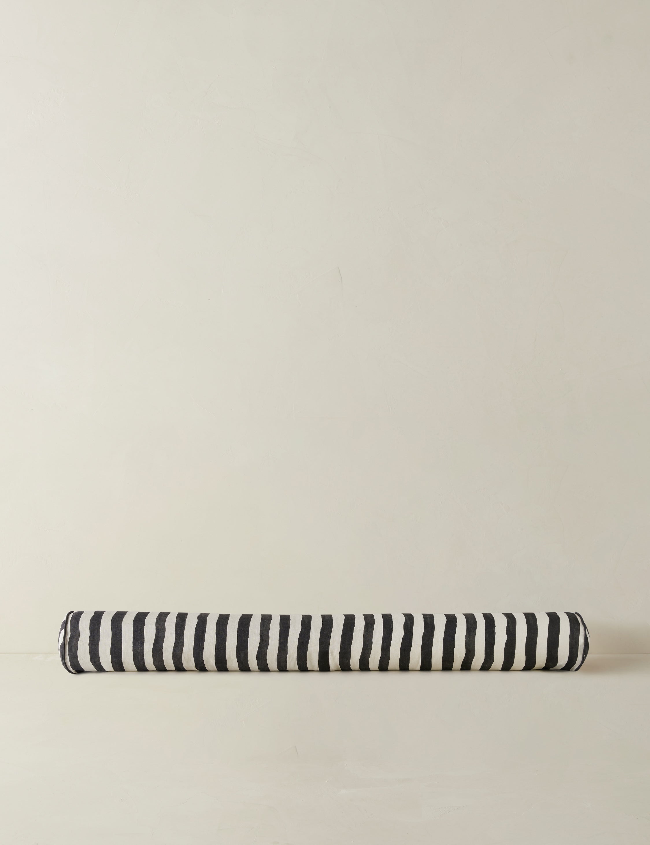 Painterly stripe linen long bolster throw pillow in black and ivory