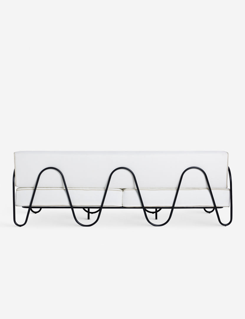 #color::ivory | Back of the Angled view of the Peggy sculptural iron frame and white cushion outdoor sofa.