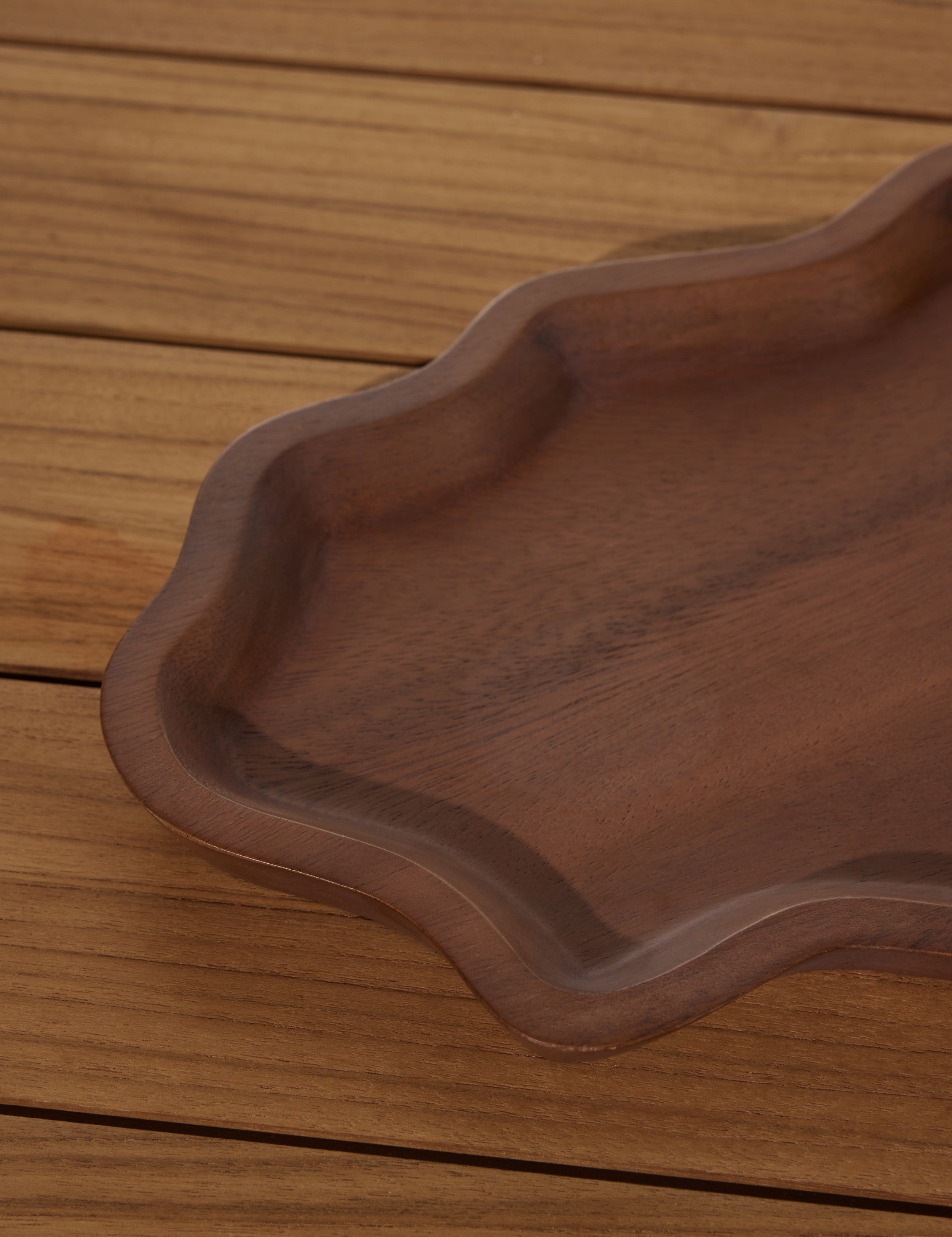 Close up of the Ruffle walnut wood Serving Tray by Sarah Sherman Samuel