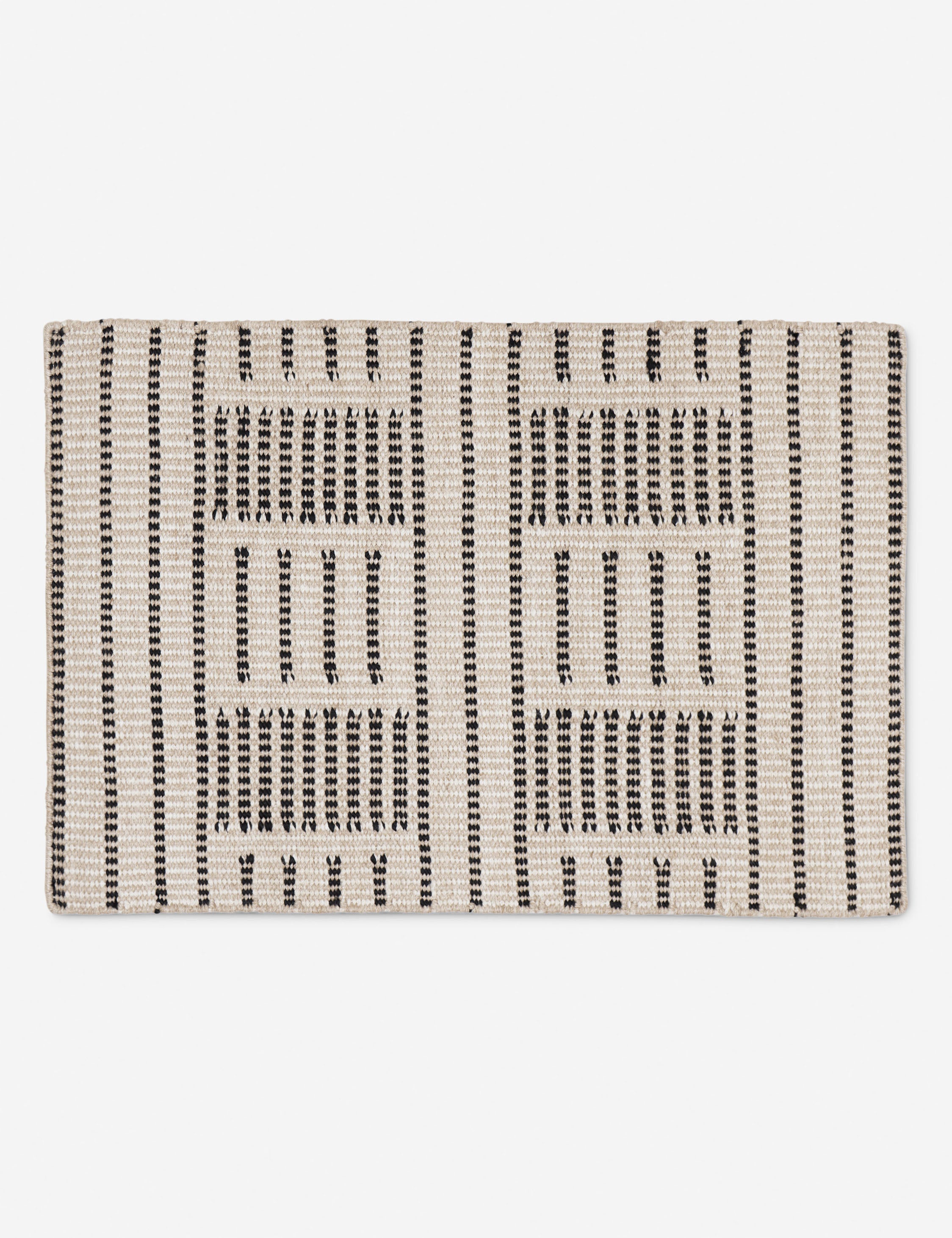Shere handwoven striped outdoor rug by Sarah Sherman Samuel in Natural.