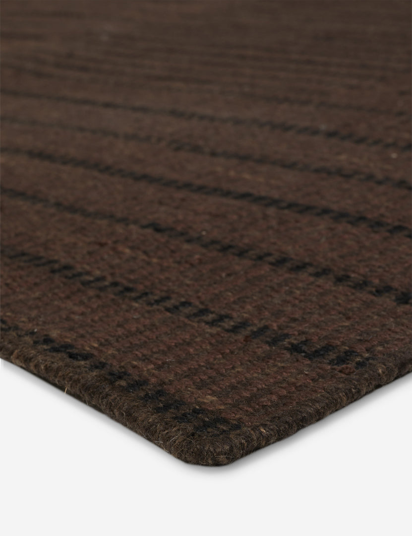 #color::brown #size::2--x-3- #size::2-6--x-8--runner #size::3--x-5- #size::5--x-8- #size::6--x-9- #size::8--x-10- #size::9--x-12- #size::10--x-14- | Close up of the Shere handwoven striped outdoor rug by Sarah Sherman Samuel in Brown
