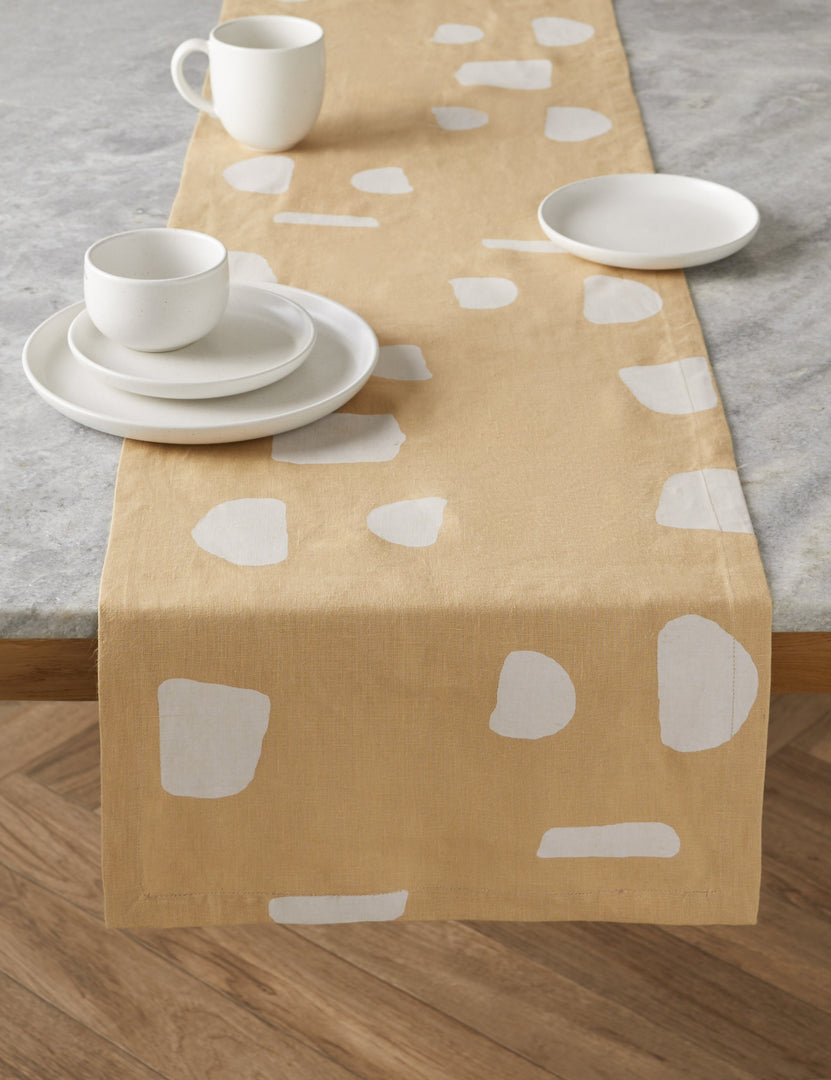 #color::salt #style::5-piece-set | The Pacifica salt white Dinnerware 5-Piece Place Setting by Casafina sits atop a yellow and white patterned table running atop a stone table