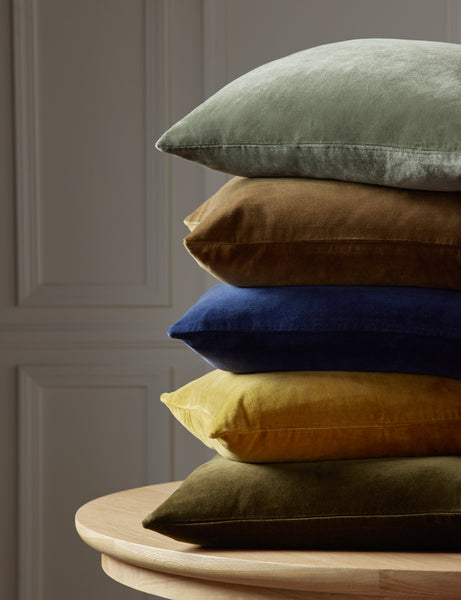 #color::shale-blue #style::square #color::toast #style::square #color::true-blue #style::square #color::mustard #style::square #color::olive #style::square  #fill type::with-feather-down-insert  #fill type::pillow-cover-only |   Charlotte velvet pillow in shale blue, toast, true blue, mustard, and olive green are stacked atop each other