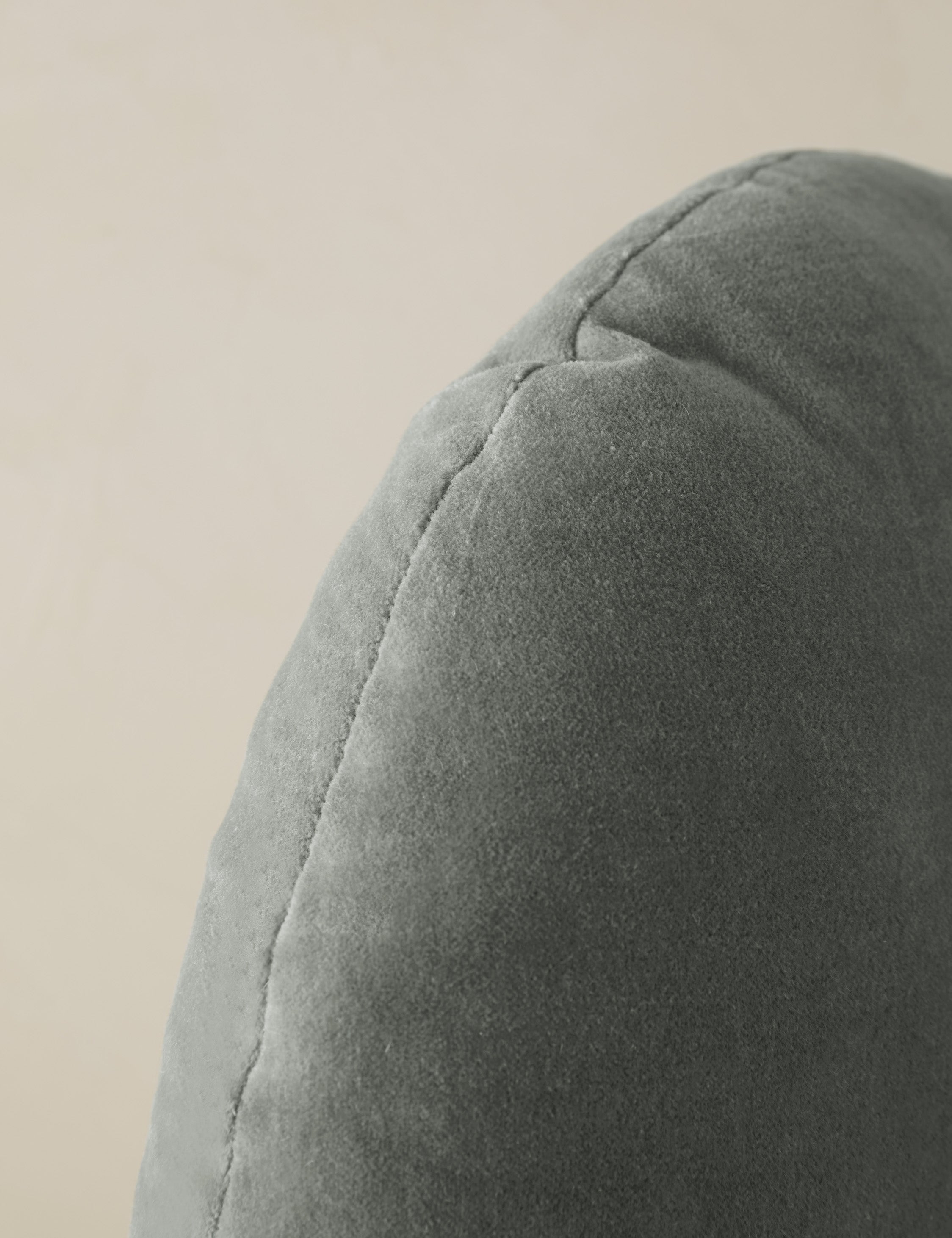 Close up of the Velvet round accent pillow in lichen