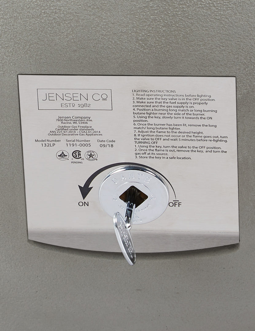 #color::shade #size::42- #configuration::natural-gas | Close up of the controls on the Benno shade round fire bowl