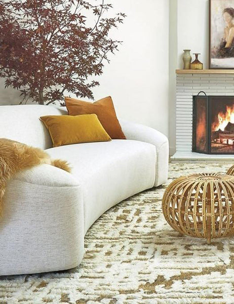 #color::mustard #style::lumbar  #fill type::with-feather-down-insert  #fill type::pillow-cover-only |   Charlotte mustard lumbar velvet pillow sits on a linen sofa with the burnt orange velvet throw pillow