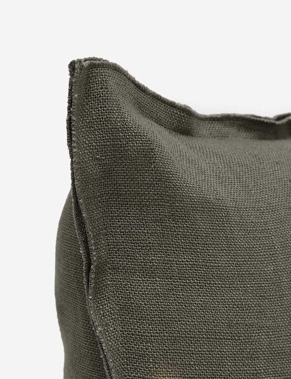 Corner of the arlo Conifer gray square pillow