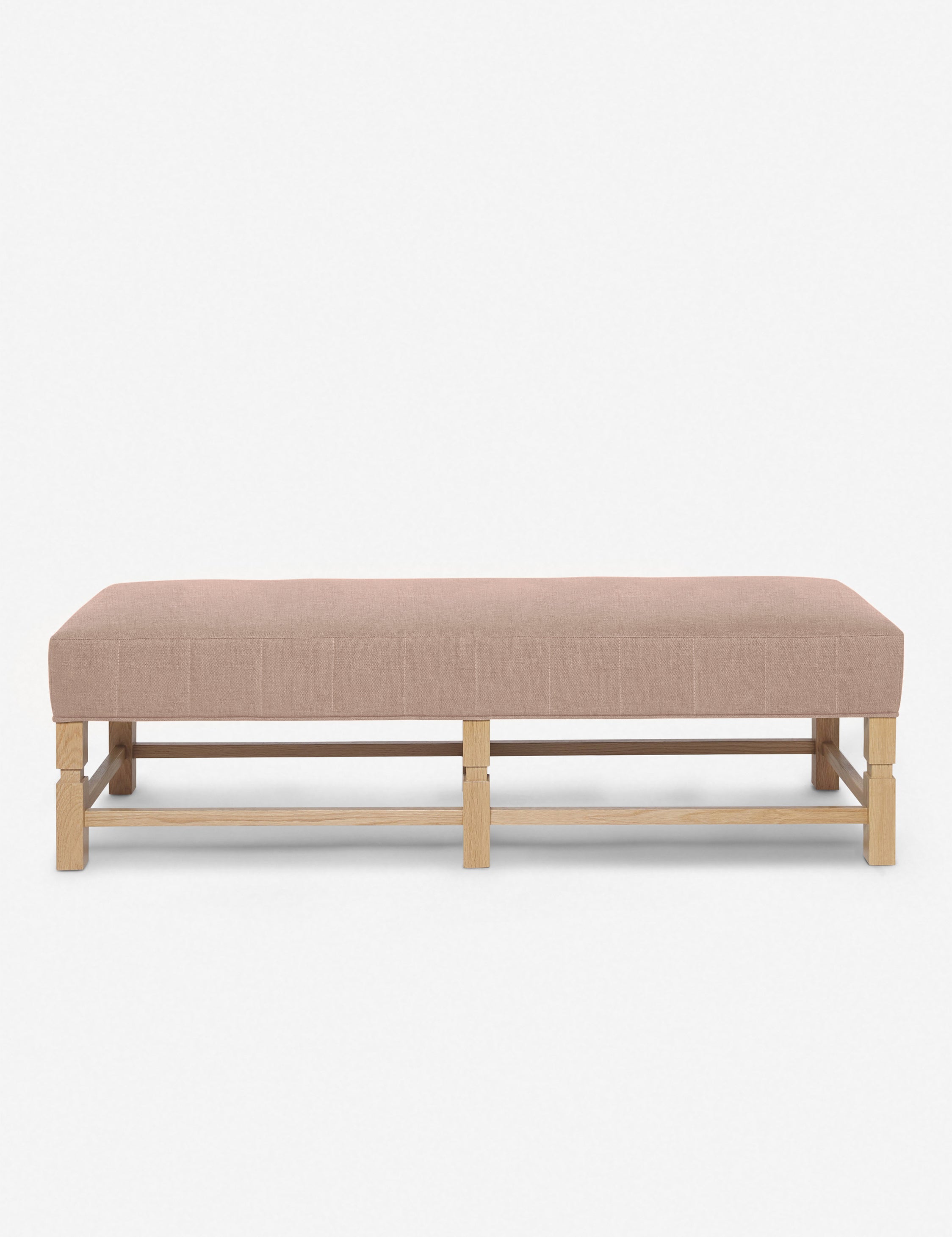 Ambleside Apricot Linen upholstered bench with carved detailing on the frame and vertical channeling around the cushion by Ginny Macdonald
