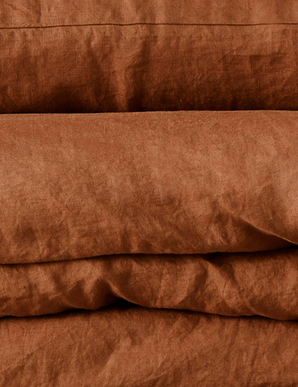 Close-up of the European Flax Linen cedar orange Duvet Set by Cultiver