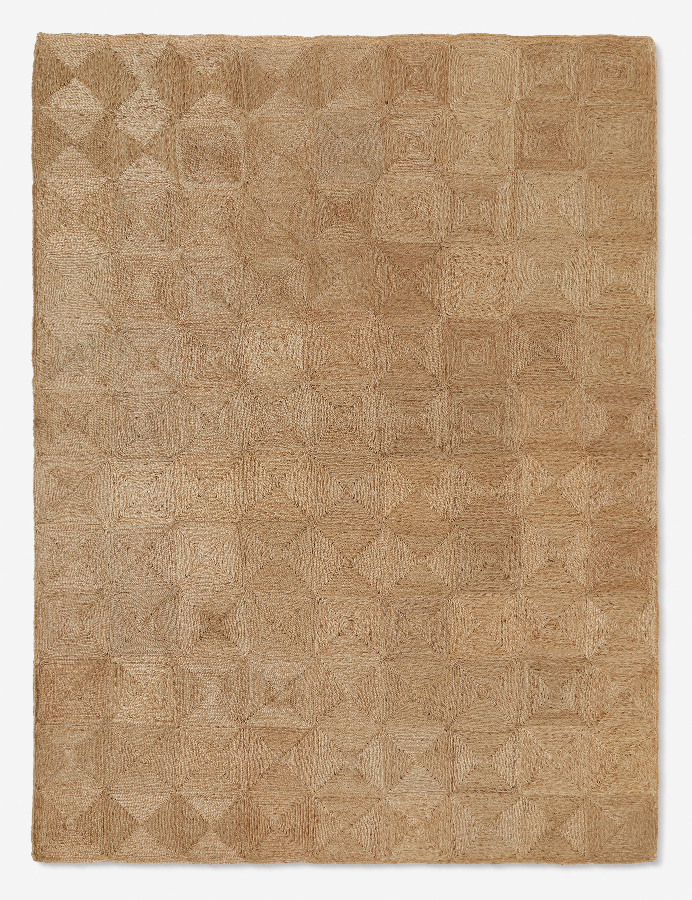 Havenhurst handwoven jute Rug with a large-scale spiral pattern by Jake Arnold