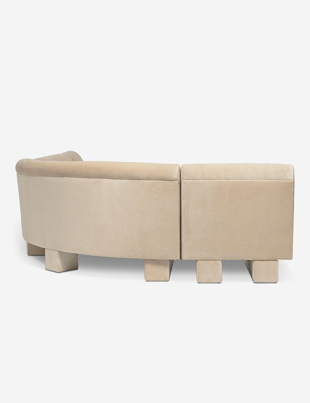 Rear view of the side of the Lena right-facing beige velvet sectional sofa with upholstered beam legs.