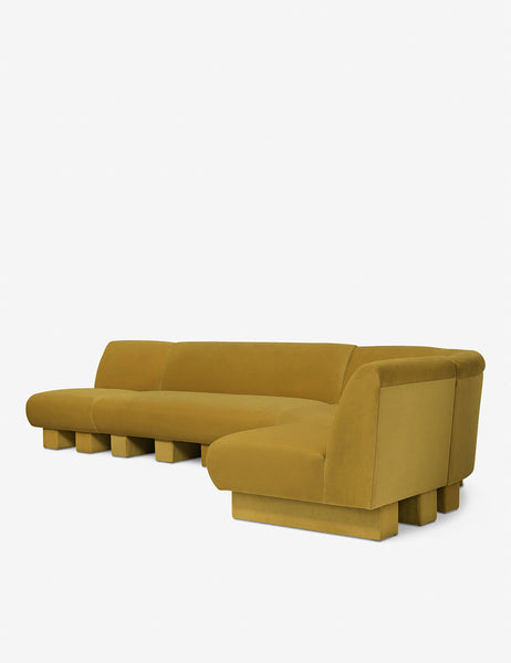 #color::goldenrod-plush-velvet #configuration::right-facing #size::142-W | Angled view of the Lena right-facing yellow velvet sectional sofa with upholstered beam legs.