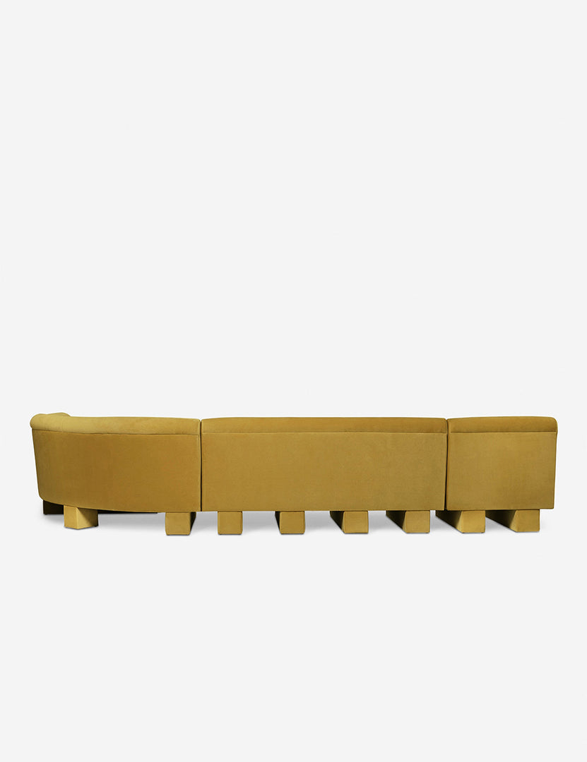 #color::goldenrod-plush-velvet #configuration::right-facing #size::142-W | Rear view of the side of the Lena right-facing yellow velvet sectional sofa with upholstered beam legs.