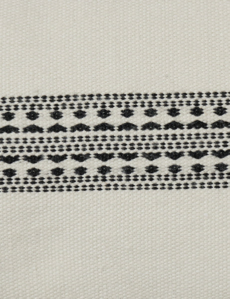#color::natural-and-black #style::lumbar | White traditional design on the Marchesa natural and black indoor and outdoor pillow