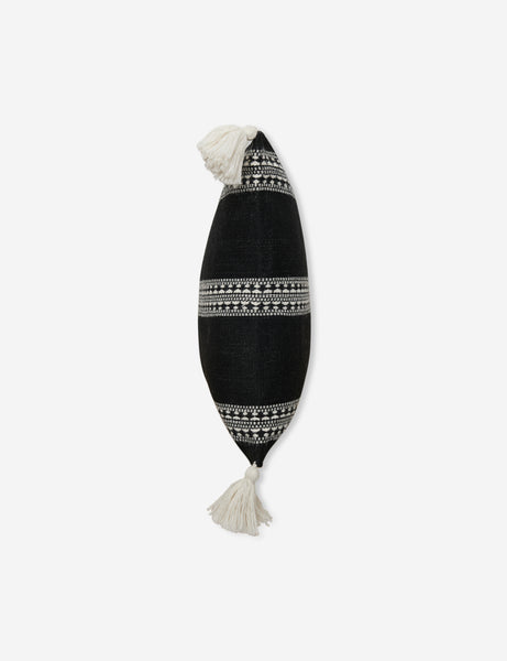 #color::black #style::square | Side view of the Marchesa black indoor and outdoor pillow with tasseled corners
