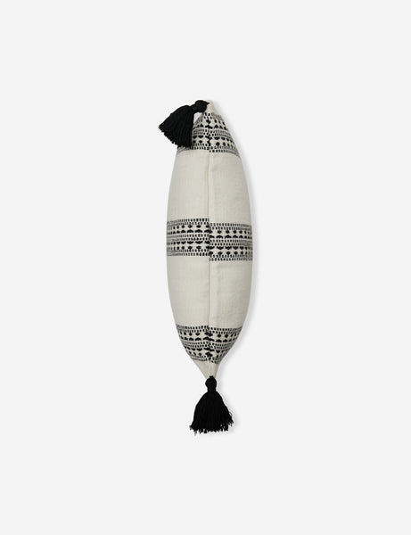 #color::natural-and-black #style::square | Side view of the Marchesa natural and black indoor and outdoor pillow with tasseled corners