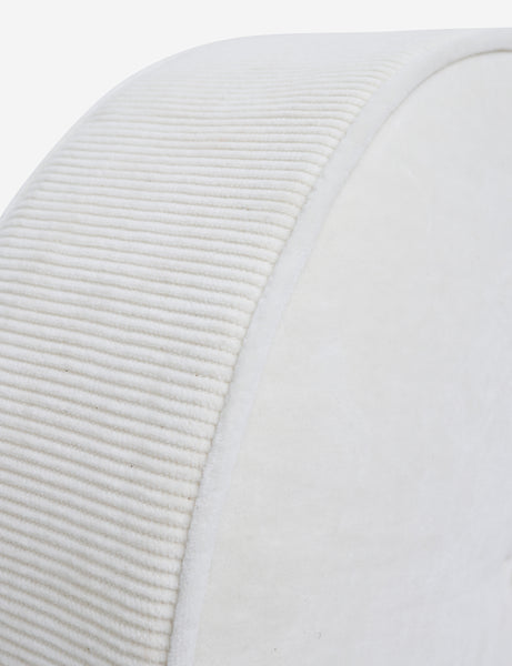 #color::ivory | Close up of the piped edges and ribbed siding on the Velvet Disc ivory pillow by Sarah Sherman Samuel