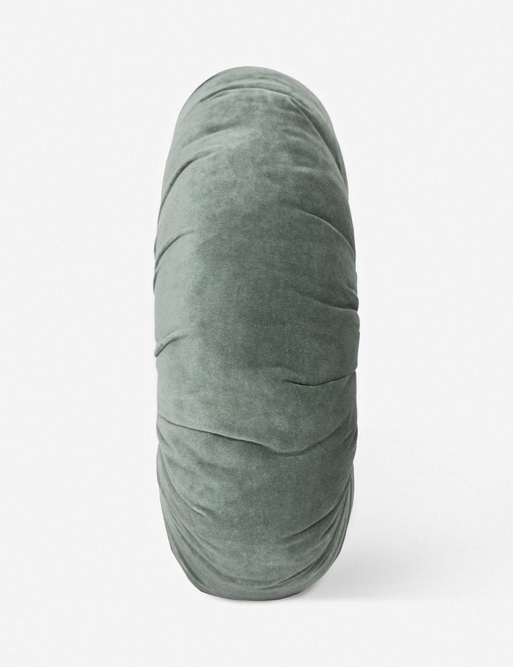 Side view of the Monroe shale blue velvet round pillow