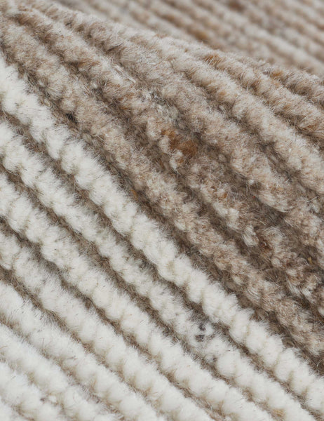 #size::2-6--x-8- #size::6--x-9- #size::8--x-10- #size::9--x-12- #size::10--x-14- #size::12--x-15- | Close-up of the white and brown tones on the Abode geometric two-toned kand-knotted floor rug by Élan Byrd