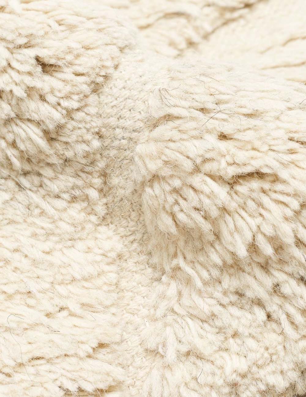 The 100% wool construction of the Arches natural Rug