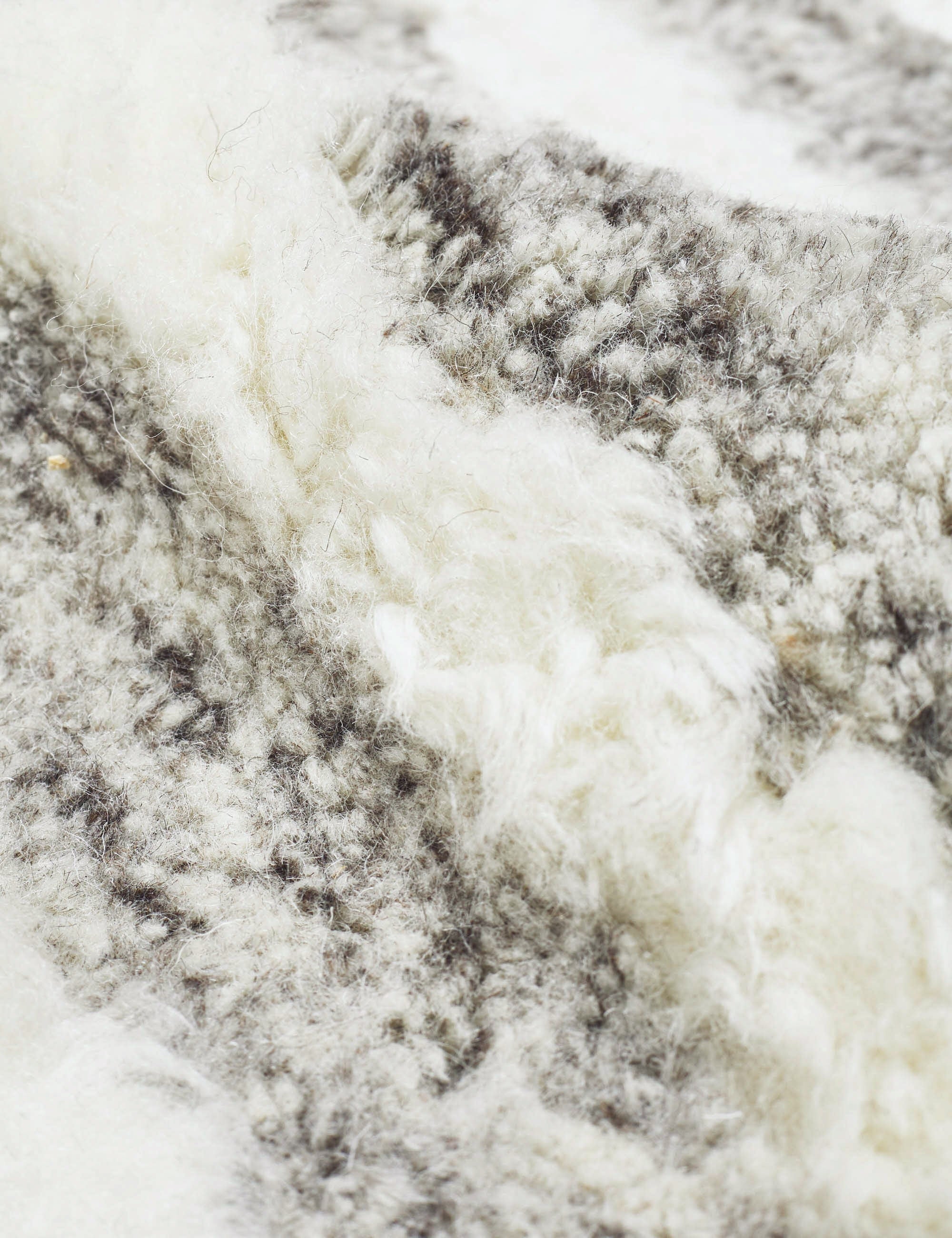 Close-up of the high-low pile texture and wool material on the braeburn rug
