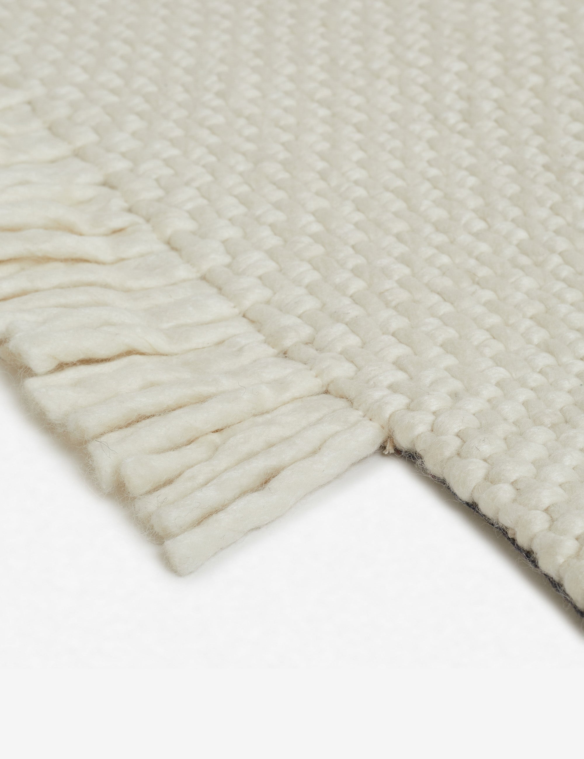 The fringe on the edge of the Joelle rust rug