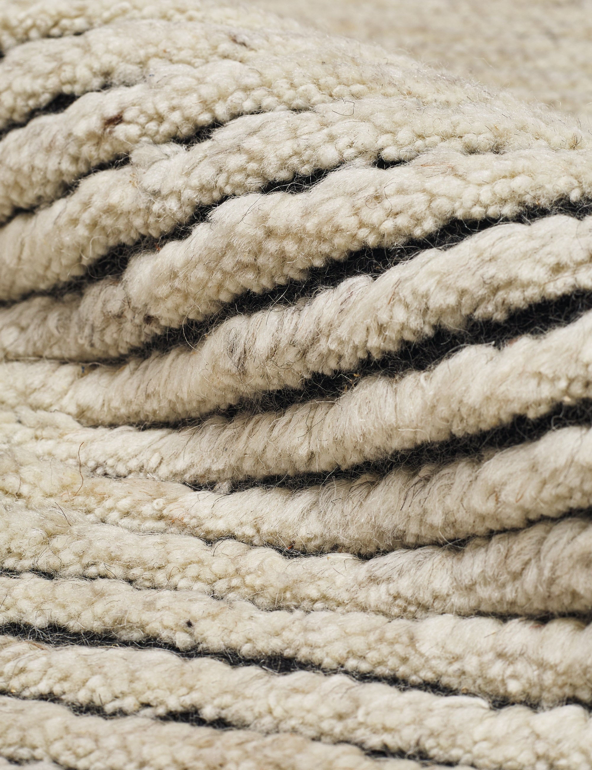 Close-up of the striped texture on the Kenzi black and natural rug